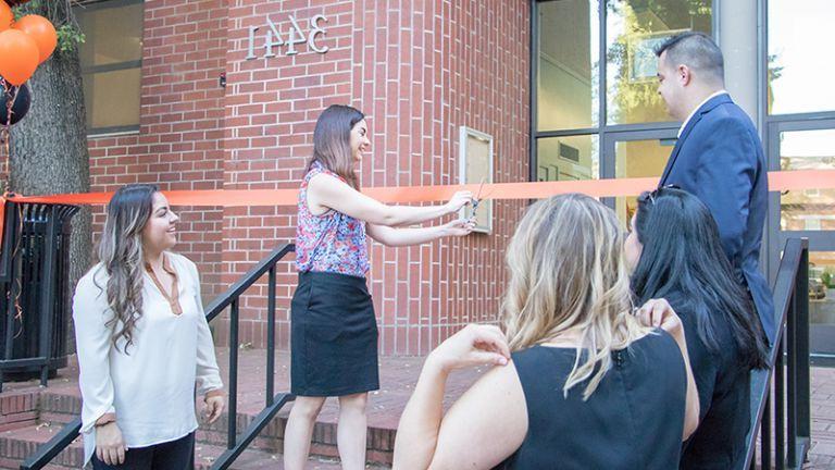 A ribbon-cutting takes place for the new Benerd大学